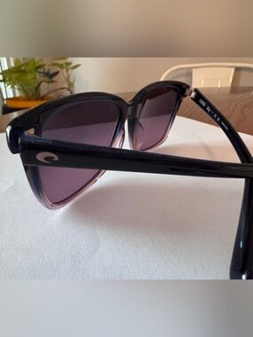 Costa Black Frame Sunglasses with Purple Lenses